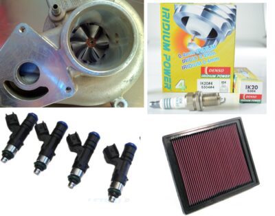 Car engine turbocharger, iridium spark plugs, fuel injectors, and high-performance air filter.