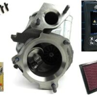 Various aftermarket automotive parts and accessories, including a turbocharger, performance air filter, screws, and a handheld tuning device.