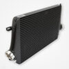 Black intercooler for a vehicle isolated on a white background.